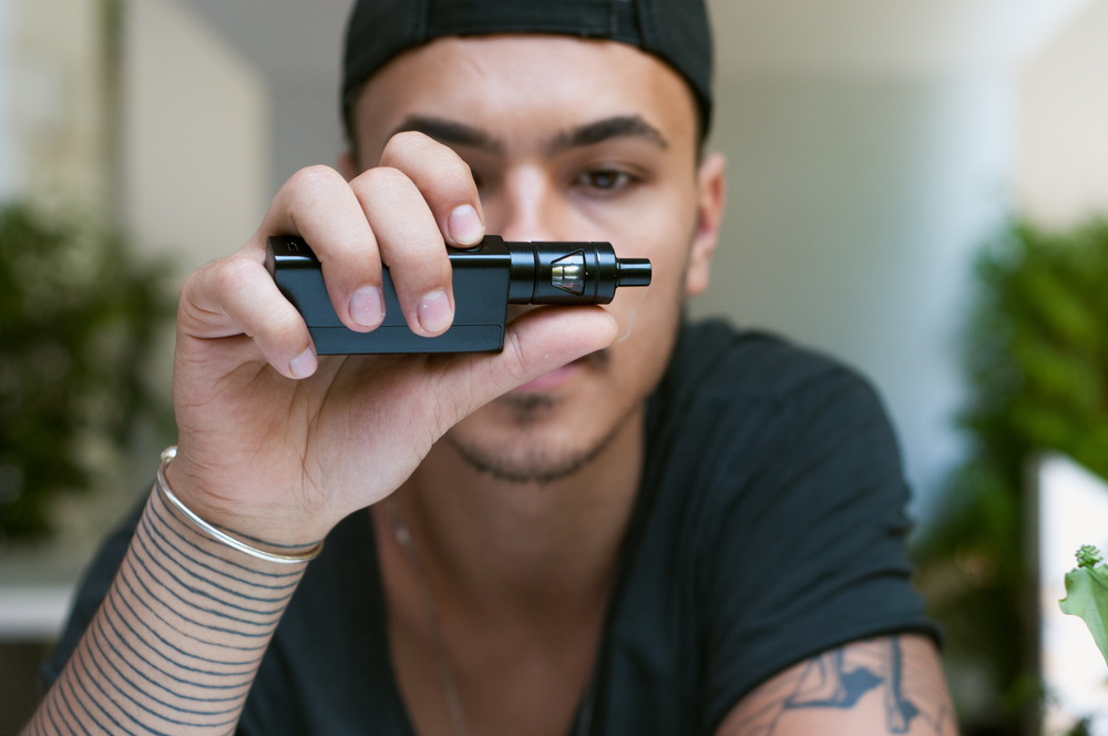 man using vape